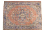 Vintage Distressed Oushak carpet with dusty blush field, faded pale blue floral medallion.
