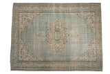 Distressed Oushak carpet, abrashed baby blue field, central bursting medallion, ram's horn vines. 7'3