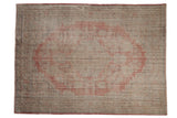 Distressed Oushak carpet with subtle blush rose red medallion, antique ivory field, 7'4