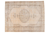 Distressed Sparta carpet, roundel medallion on ivory-sand field, faded brown, green-blue patterns, even wear.