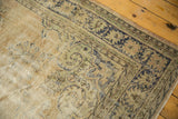 Vintage Distressed Oushak rug with prominent foundation wear and etched floral details.