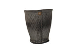 Textured dark gray recycled tire rubber basket planter, with white stitching and rustic button.