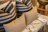 Reclaimed natural jute pillow with subtle, finely textured stripe pattern.