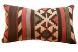 Reclaimed Antique Kilim Fragment lumbar pillow with geometric patterns in cream, brown, red, and green, 10x14.