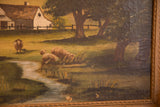 Close-up of antique oil painting showing sheep by a stream, crackling, and carved frame detail.