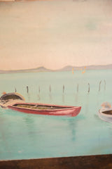 Red boat floats on tranquil blue water in the vintage New England painting.