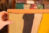 Broken wooden frame corner of the vintage portrait painting.