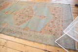 Traditional Persian Malayer carpet corner; slate blue grey field, delicate Herati border, fringed.