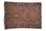 Vintage Lilihan rug: dusty cochineal red, tree of life design, blossomed florals, navy blue border.