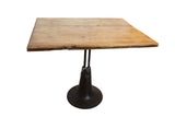 Vintage reclaimed wooden end table with industrial metal base and faded sage cream paint.
