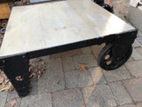 Black Cart Coffee Table, an upcycled antique factory cart with light wood top.