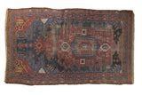 Antique Kurdish Hamadan rug: oversized asymmetric medallion, mostly even wear, cherry red and navy.