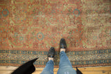 Close-up view of the low pile on an antique Persian runner, showing even wear to the knot heads.