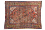 Antique Qashqai rug with rich terra cotta, allover shadow boteh motif, saffron gold border.