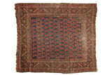 Antique Kurdish hand-knotted square rug, allover brick red paisley on navy field, geometric bronze border.