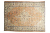 Vintage Distressed Oushak carpet with an apricot medallion and ivory floral vinery, 6'6