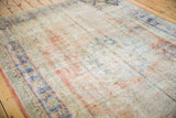 Distressed Oushak carpet texture with mostly even wear across knot heads and foundation.