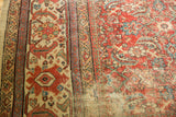 Vintage Mahal carpet detail: cream border, Herati motif, cherry red, mostly even wear.