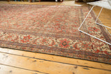 Contrasting floral motifs of vintage Mahal rug's main border, Herati field, and secured fringe.
