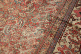 Herati motif field and contrasting main border of the vintage Mahal carpet, with mostly even wear.