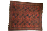Vintage Ersari square carpet, cochineal red, navy blue, chocolate brown geometric medallions.