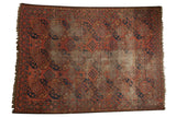 Antique Ersari carpet with oversized gul and diamond motifs in cochineal red, cobalt blue.