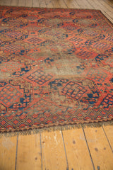 Antique Ersari carpet's fully secured ends with cochineal red and cobalt blue design.