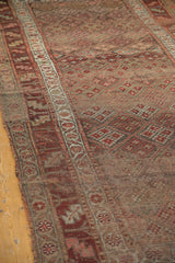 Antique Kurdish runner's border, featuring playful alternating color fills.