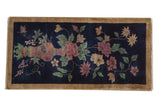 Vintage Chinese Art Deco rug runner, ornate potted plant and colorful florals on dark cobalt blue.