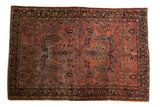 Vintage American Sarouk rug, central medallion, allover floral pattern on dusty brick red.