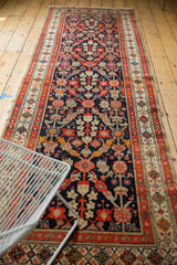 Vintage Malayer runner's navy blue field with allover Henna plant design and lattice.