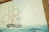 Textured wormwood frame detail of the seascape painting.
