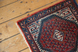 Thick hand knotted pile of vintage Mir Sarouk rug with central ivory medallion.