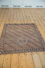 Antique Caucasian rug with brick red and sky blue geometric lattice, floral motifs, prayer niche.