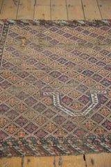 Intricate prayer niche and geometric lattice on the antique Caucasian rug, featuring brick red, sky blue, and visible foundation.