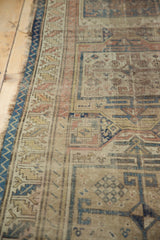 Antique Caucasian runner's blue zigzag edge, serrated leaf border, and rectilinear patterns.