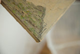 Artist Luciani's signature on the bottom left corner of the textured painting.
