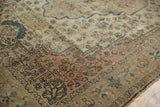 Farahan Sarouk border and field detail with dusty blue, faded brick red, and foundation showing.