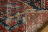 Antique Malayer rug, cochineal red and indigo blue pile texture, with hand-knotted foundation.