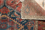 Antique Malayer rug: Harshang motif pile, folded reverse showing foundation, aged edges.