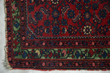 Recessed pile detail on the brilliant green border of a fine antique Persian Hamadan rug.