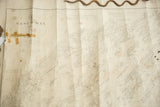 Antique Casco Bay Maine nautical map with visible paper folds, discoloration, and historic tape wear.