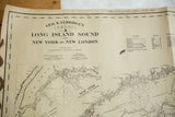 Eldridge's Long Island Sound map title with tide book reference and paper creasing.
