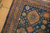 Antique Tehran rug corner with mostly even wear showing faint foundation and intricate geometric borders.