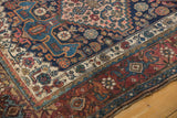 Antique Kurdish Bijar rug corner: intricate Herati motifs, geometric borders, low pile, faint foundation.