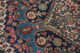 Hand-knotted Herati design detail on an Antique Kurdish Bijar rug in navy, sky blue, and blush.