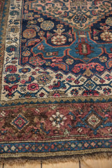 Antique Kurdish Bijar rug: multi-layered borders with low pile in cream and navy.