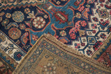 Rich Herati pattern, low pile, and secured edge of an antique Kurdish Bijar rug with woven reverse.