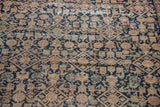 Antique Malayer runner detail: worn Herati pattern, showing navy blue motifs and exposed foundation.