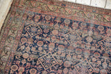 Antique Malayer rug detail, Herati design in navy, blush, showing extensive wear and foundation.